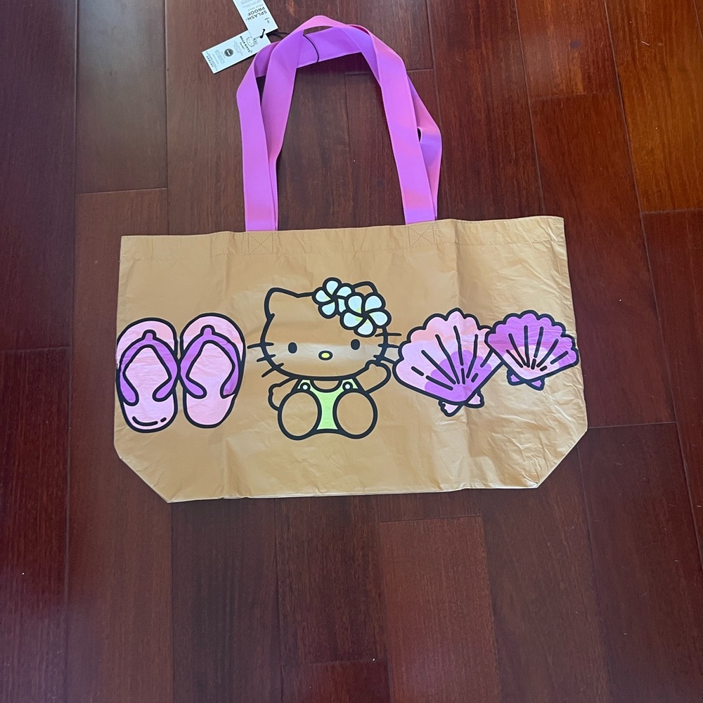 ALOHA Collection x Hello Kitty (Sanrio) Reversible Holo Holo (Hawaii Exclusive)